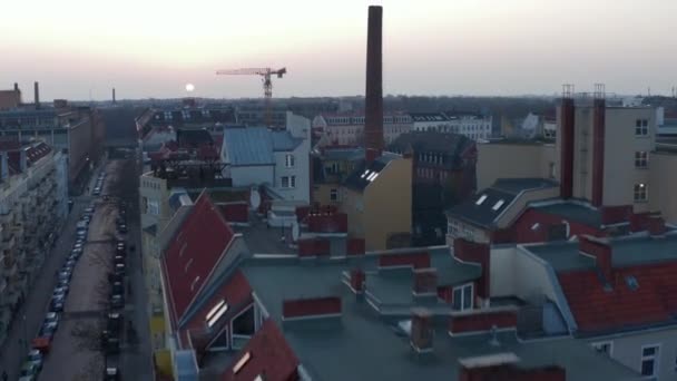 AERIAL: Flight over Beautiful Berlin Neighbourhood Rooftop Cityscape during Sunset  - Filmati, video