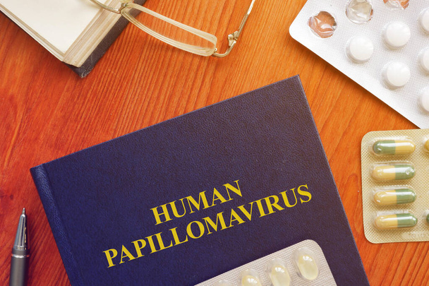 Käsitteellinen valokuva, jossa painettu teksti Ihmisen papilloomavirus
 - Valokuva, kuva