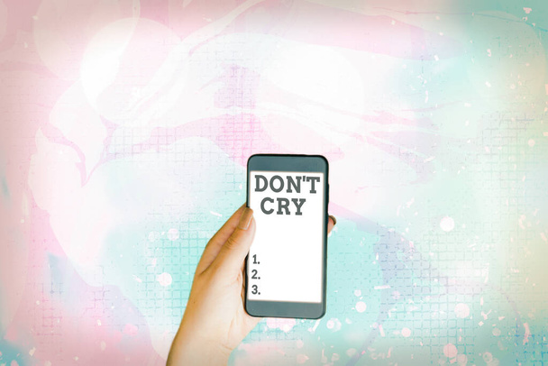 Text s nápisem Don T Cry. Konceptuální fotografie Prolévat slzy typicky jako výraz bolesti nebo zármutku. - Fotografie, Obrázek