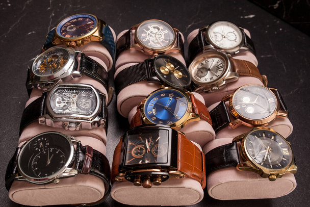 storage black leather box with collection of men wrist watches - Φωτογραφία, εικόνα