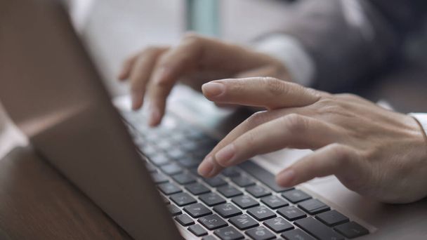 Female Hands Typing On Laptop Keyboard - 写真・画像
