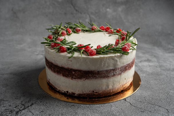 Homemade cherry cake with vanilla cream and cherry jelly on the gray background - Photo, Image