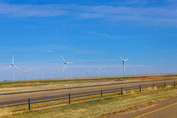 Wind generators at electric farm on Texas along with wind energy - Photo, Image