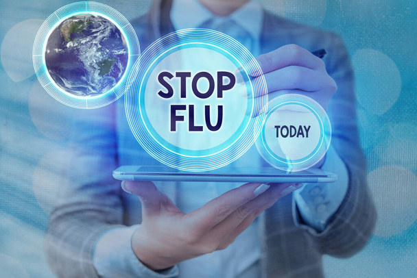 Signo de texto que muestra Stop Flu. Foto conceptual Tratar la enfermedad respiratoria contagiosa causada por el virus de la influenza Elementos de esta imagen proporcionados por la NASA
. - Foto, imagen