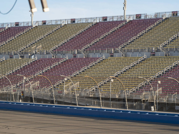 Large stadium seating at race track in the afternoon sitting empty. - Photo, Image