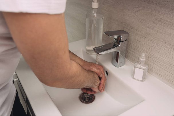 Washing hands rubbing with soap man for corona virus prevention, hygiene to stop spreading coronavirus.sanitiser, covid 19 - Zdjęcie, obraz