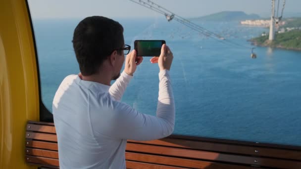 Man capturing amazing view from cable car in Phu Quoc, Vietnam - Footage, Video