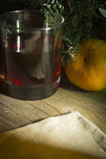Wine and tangerines on a New Year's table - Valokuva, kuva