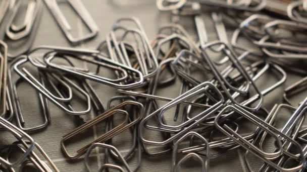Background of metal paper clips - Footage, Video