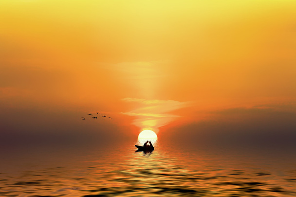 silhouet van een paar in de boot wanneer de zon ondergaat - Foto, afbeelding