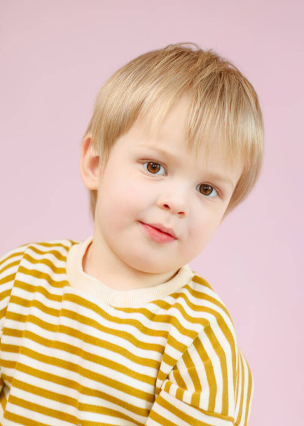 portrait of little model boy in studio - Фото, зображення