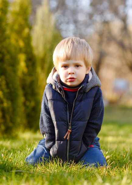 portrait of little model boy in nature - Фото, изображение