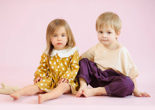 studio portrait of a boy and a girl - Photo, Image