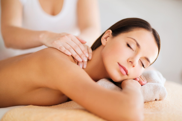 Beautiful woman in spa having massage - Fotografie, Obrázek