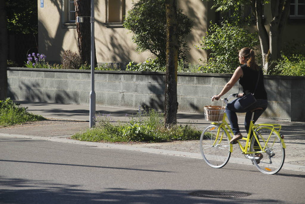Biking in a street of Zurich - Photo, image
