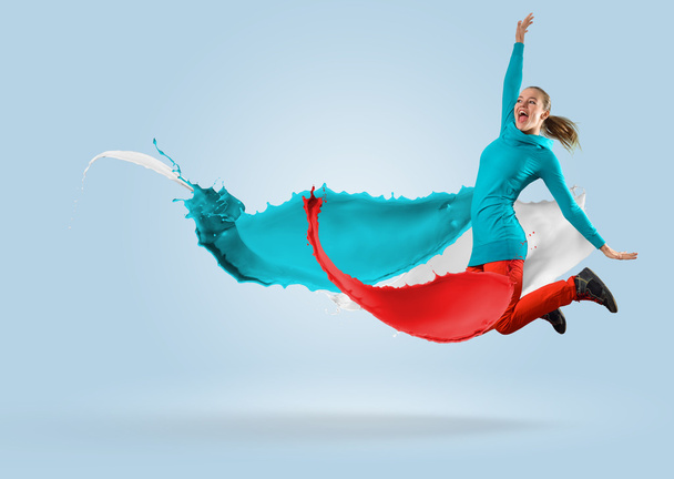 Young female dancer jumping - Фото, изображение