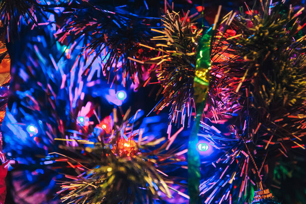 Christmas tree with Christmas decorations is indoor shooting close-up - Fotoğraf, Görsel