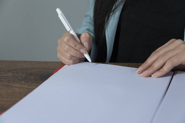 business woman hand pen with document on desk - Foto, Imagem