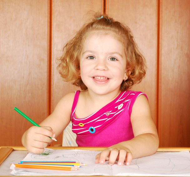 Happy little girl drawing - Zdjęcie, obraz