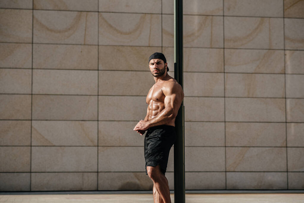 Sexy man posing topless in the hot sun. Fitness. Lifestyle - 写真・画像