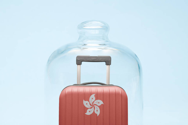 Suitcase with Hong Kong flag design in quarantine minimal creative coronavirus travel restriction concept. - 写真・画像