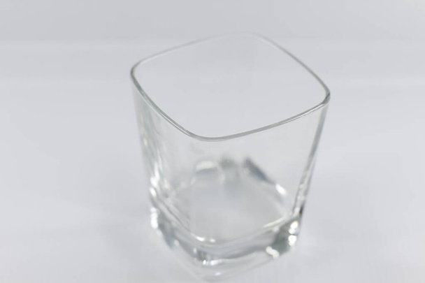 Empty glass  in white background - Φωτογραφία, εικόνα