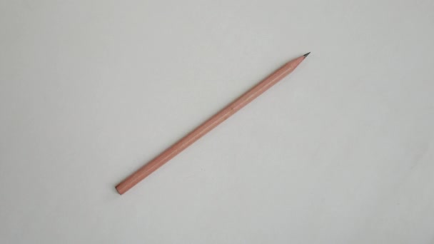 Pencil rotation in stop motion seen. - Footage, Video