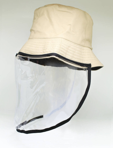 Cara-escudo chapéu anti vírus covid-19
 - Foto, Imagem