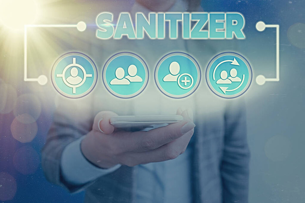 Text sign showing Sanitizer. Conceptual photo liquid or gel generally used to decrease infectious agents. - Photo, Image