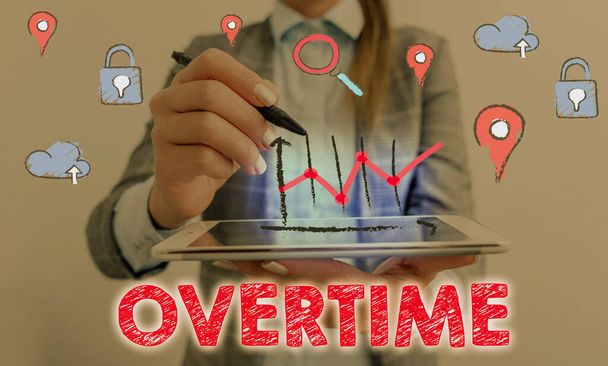 Conceptual hand writing showing Overtime. Business photo text Time or hours worked in addition to regular working hours. - Photo, Image