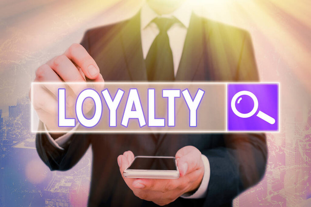 Handwriting text Loyalty. Concept meaning faithfulness to commitments or obligations Quality of staying firm. - Photo, Image