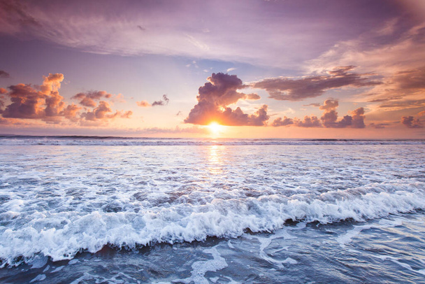 Amazing sunset from Bali Double Six beach surf waves and colorful clouds - Foto, immagini