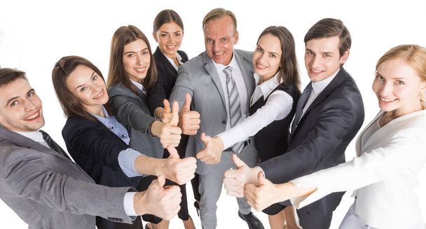 Team of happy successful business people with thumb up isolated over white background - Foto, imagen