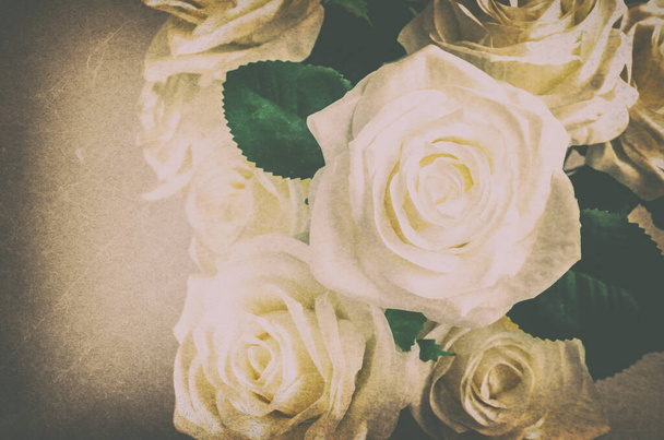 Close up of white Artificial rose with grunge and vintage tone - Photo, Image