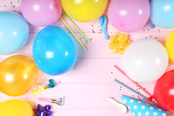 Flatlay composition with accessories for a party or birthday on a colored background with place for text top view. - Foto, Bild