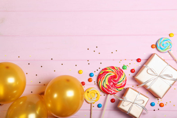 Flatlay composition with accessories for a party or birthday on a colored background with place for text top view. - Foto, imagen