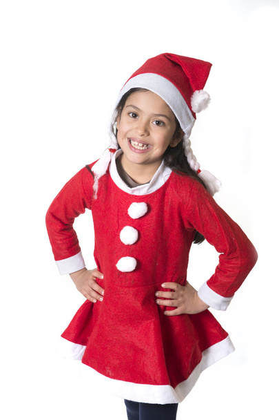 Cute Little Girl in Santa Claus costume happy holding presents at Xmas - Фото, изображение