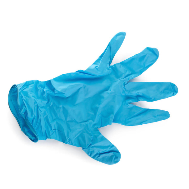 白い背景に隔離された医療用途のための青ゴム手袋. - 写真・画像