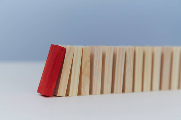 Beginning of end. Financial crisis. Total collapse mockup, copy space. Domino effect. Falling domino blocks, red plank - Fotoğraf, Görsel