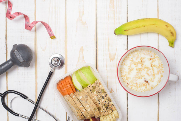 Diet food for healthy eating on white wooden  background  - Fotó, kép