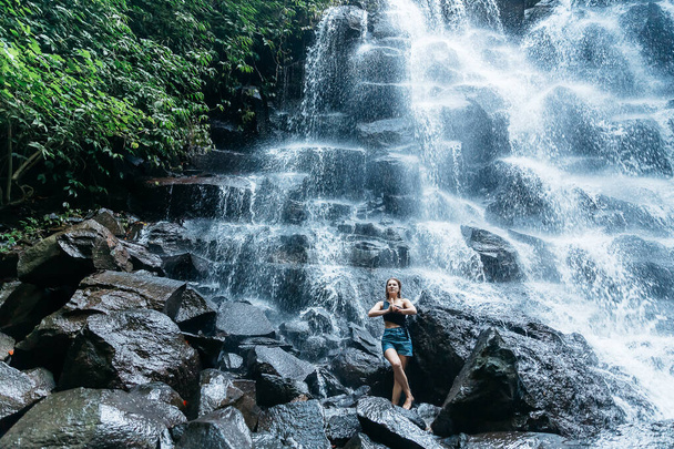Waterfall on Bali with girl - Photo, Image