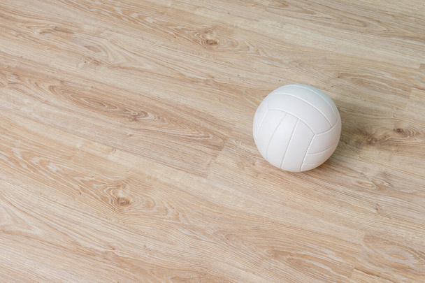 Close Up Of Volleyball Ball On Wooden Floor.  - Foto, Imagem