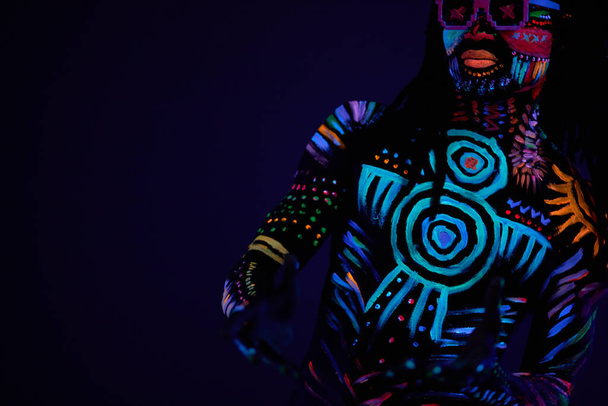 happy cool fashion dancer in fluorescent body art - Foto, immagini