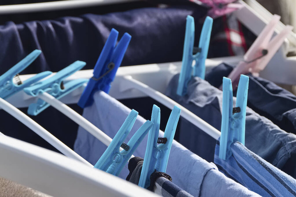 Washed clothes on a drying rack - Photo, Image