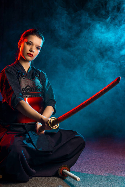 woman kendo fighter isolated. japanese martial art of sword fighting - Foto, Bild