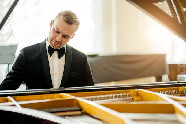 talented young pianist man practicing - Fotografie, Obrázek