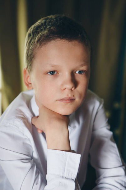 isolated photo: portrait of a serious young guy. the concept of healthy eyes, vision - Φωτογραφία, εικόνα