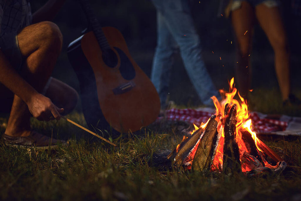 Bonfire at night on a friends picnic in autumn - Photo, Image