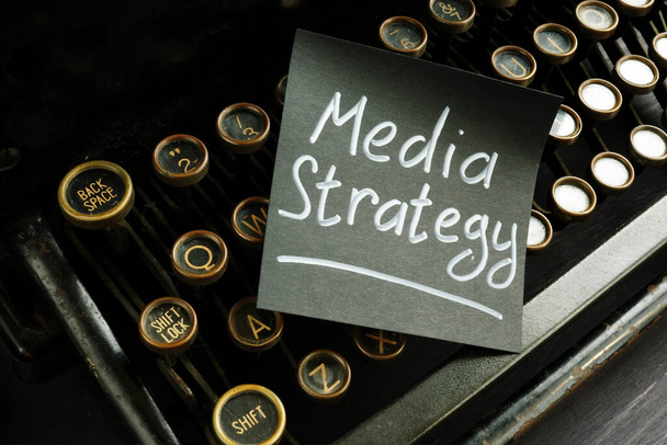 Media strategy for marketing. Retro typewriter and sheet. - Фото, зображення