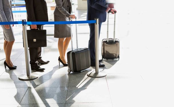 Business people queueing for check in airport - Φωτογραφία, εικόνα
